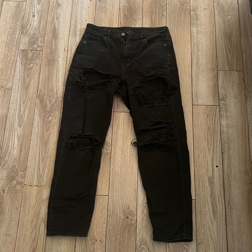 Black ripped jeans. American Eagle. Size 8.